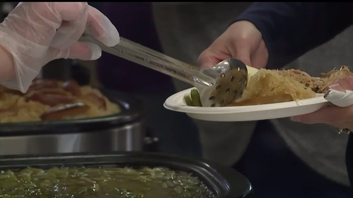 Volunteers prepare to serve pork and sauerkraut on New Year’s Day in central Pa. [Video]